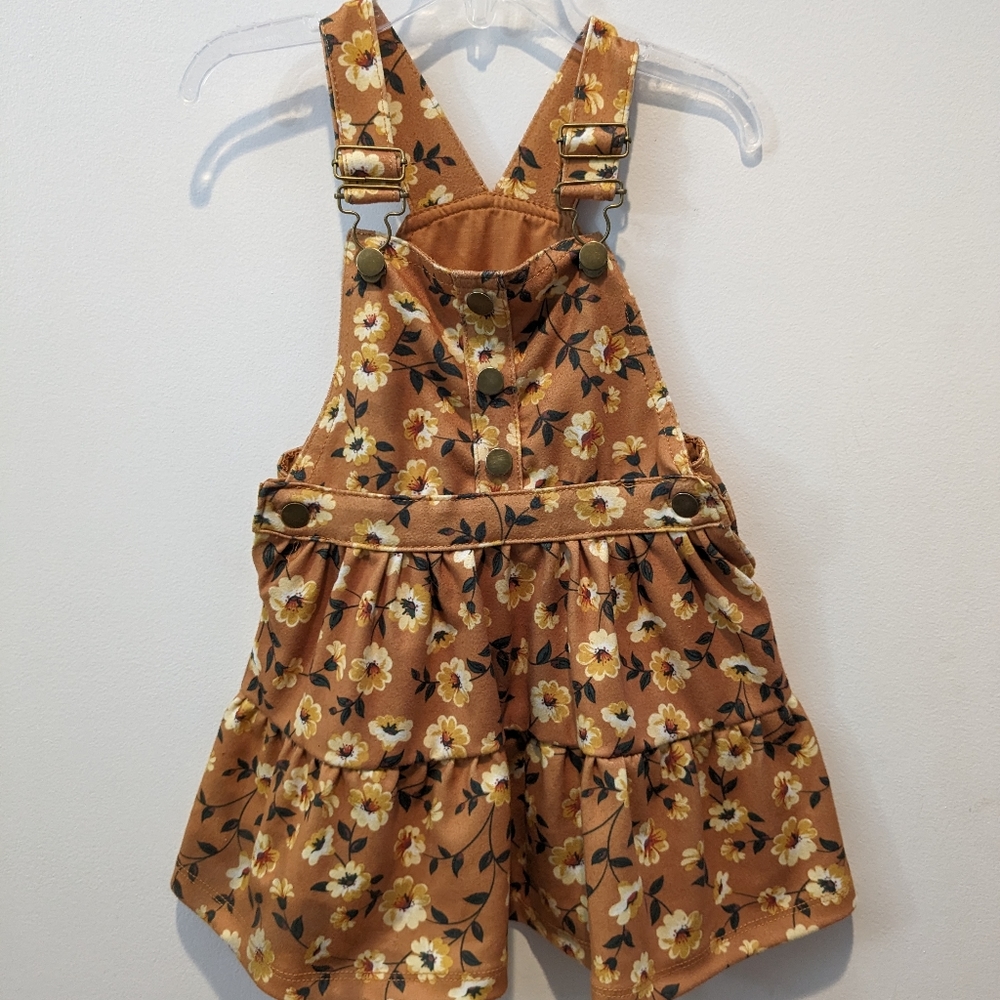 Little girls size 2T autumn colored floral dress. Adjustable at shoulders.